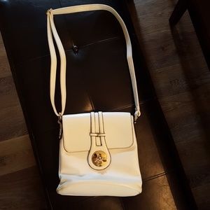 Very cute white woth black trim purse